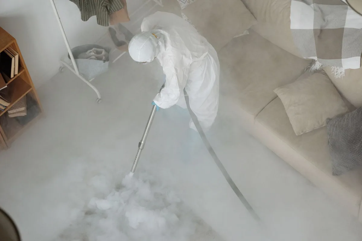 Biohazard cleanup technician in protective equipment, Belleville, WI